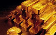 Цены на золото накаляются после слабеющего доллара
