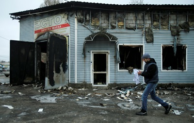 Донецк сейчас: сгоревшая СТО, обстрелянный дом, церковь, школа