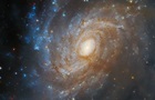 Hubble снял спиральную галактику в созвездии Апуса