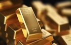 Золото продолжает удерживать рекордную цену
