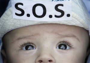В прошлом году иностранцы усыновили 970 украинских детей. Лидеры - США и Италия