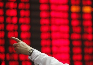 Азиатские рынки акций закрылись снижением из-за неприятия риска
