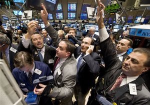 Рынки: Фондовые торговцы ведут себя настороженно
