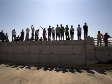 Бунт заключенных на границе Мексики унес жизни 23 человек