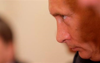 Путин по телефону поговорил с Асадом о химическом оружии