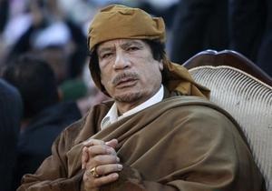 СМИ: На похоронах Каддафи присутствовали четыре человека