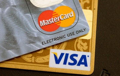 Visa и MasterCard перестали обслуживать клиентов банка Россия  
