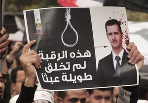 Представитель оппозиции Сирии попросит помощи в свержении Асада
