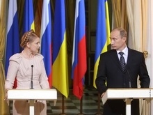 Путин пригласил Тимошенко в Москву на 2 октября