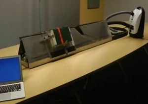 Инженеры совместили сканер для книг с пылесосом