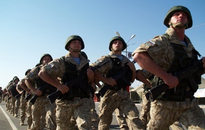 В НАТО отмечают отвод российских войск от границы с Украиной