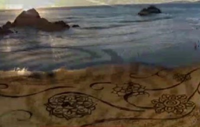 Кто рисует  полотна  на пляжах США? - репортаж