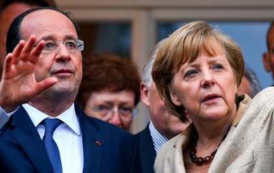 Меркель и Олланд призвали Путина содействовать диалогу в Украине