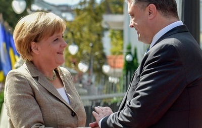 Порошенко и Меркель обсудили роспуск Рады и пути мирного урегулирования кризиса