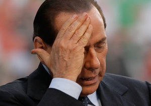 Суд Милана приговорил Берлускони к четырем годам тюрьмы
