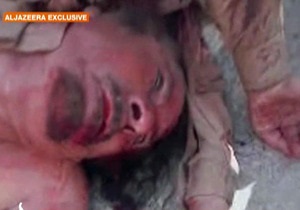 Фотогалерея: Живым или мертвым. Из Ливии сообщают о смерти Муаммара Каддафи