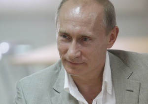 Путин носит фото семьи в бумажнике и не пользуется мобильным телефоном