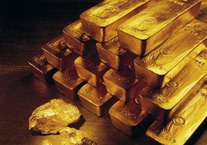 Мировые цены на золото растут из-за ослабления доллара