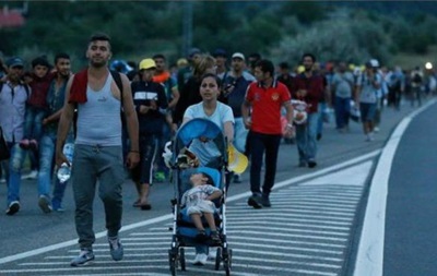 Мигранты из Венгрии прибывают в Австрию