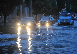 Фотогалерея: Капитаны ближнего плаванья. Большой августовский потоп в Киеве