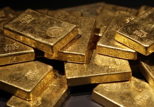 Мировые цены на золото снижаются из-за падения котировок евро