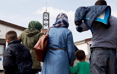 В Германии приняли спорный закон о воссоединении семей беженцев