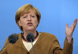 Меркель выступила против списания части долгов Греции