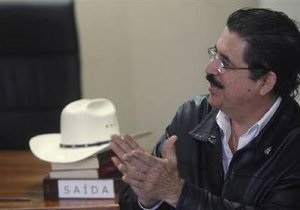 Избранный президент Гондураса пообещал разрешить Селайе выехать за рубеж