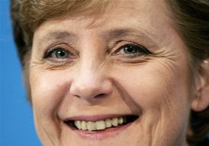 Меркель стремится упредить торговую войну с Китаем
