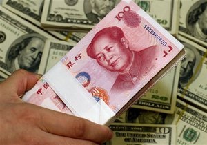 Китайский юань поставил очередной рекорд к американскому доллару