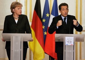 Меркель и Саркози обсуждают в Париже план спасения еврозоны
