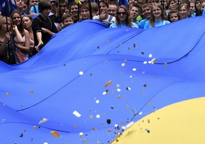Фотогалерея: Сине-желтый праздник. В Киеве состоялось шествие по случаю Дня государственного флага