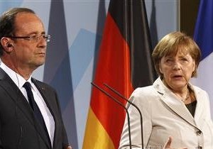 Олланд и Меркель прибыли на встречу в Реймсе