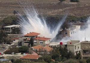 Фотогалерея: Огонь на предупреждение. Израиль обстрелял территорию Сирии