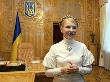 НГ: Путин поможет Тимошенко поднять рейтинг