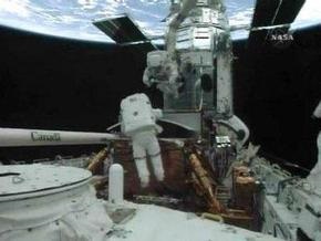 Астронавты Atlantis завершили первый выход в открытый космос
