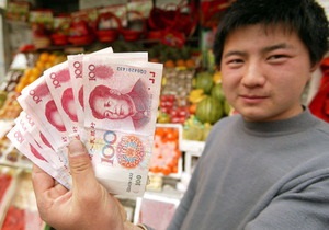 КНР отказывается провести ревальвацию юаня