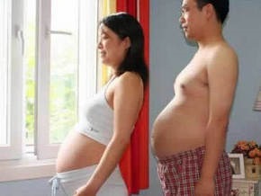 Во время беременности жен и подруг мужчины также прибавляют в весе