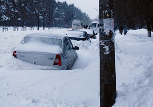 новости Киева - снег - наводнение - Из Киева за сутки вывезли более 14 тысяч тонн снега