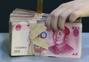 Курс юаня к доллару установил новый рекорд