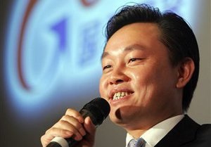 Китайский миллиардер приговорен к 14 годам тюрьмы