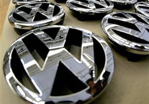 Volkswagen планирует завершить сделку с Porsche в 2014 году