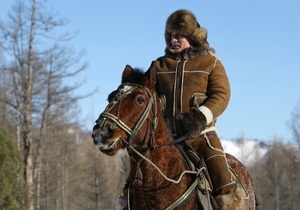 Фотогалерея: Путин в Сибири. Унты, лошади и чай на морозе