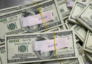 Курс доллара к главным валютам растет на опасениях за мировую экономику