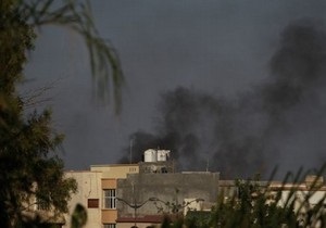 Повстанцы захватили пригороды Триполи, авиация НАТО бомбит резиденцию Каддафи