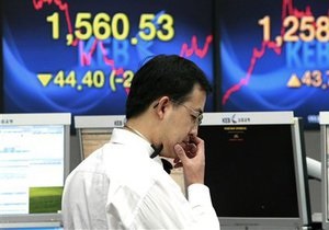 Акции в Китае подорожали на ожиданиях отчетов
