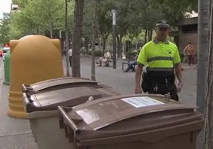 В испанском городе будут охранять мусорные баки от бедняков