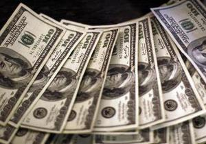 Долар плаває біля багатомісячних мінімумів, очікуючи компромісу у Вашингтоні
