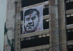 Новини Києва - Янукович - У центрі Києва з явився плакат Януковича з червоною крапкою на лобі