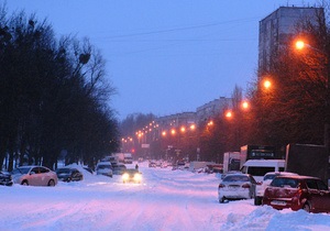 Сніг в Києві - ситуація на дорогах - затори: У Києві знову падає сніг